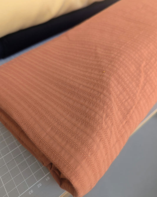 Meterware strukturierter Baumwollstoff zartes orange